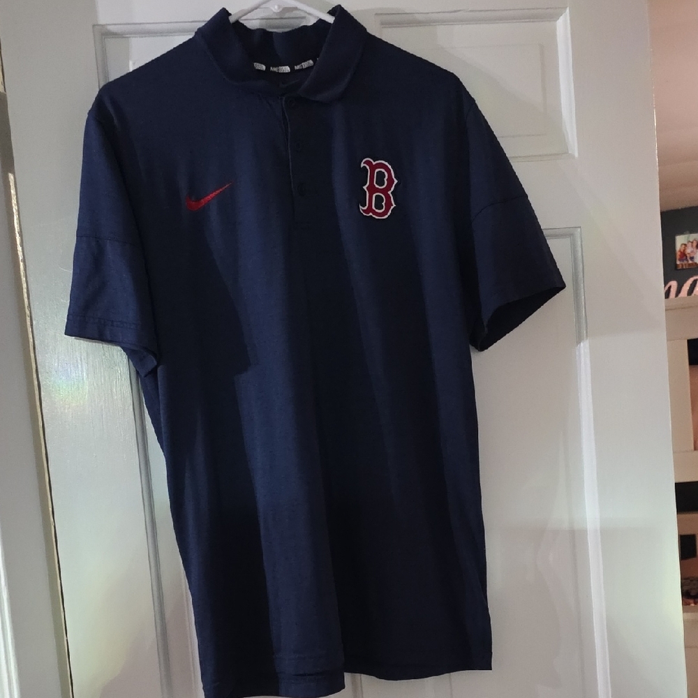 Nike Men's Dark Blue Polo with Red Logo
